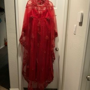 Women’s floor length, lace and sequins. Corset waist and long floor length cape